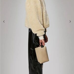 Rains wash bag size small in sand color